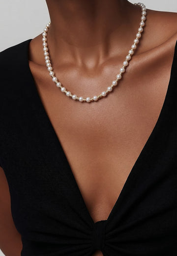 Solid gold and imitation pearl necklace